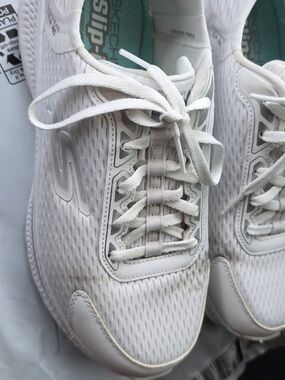 Skechers Women's White Athletic Slip-In Sneakers with Light Mint Lining